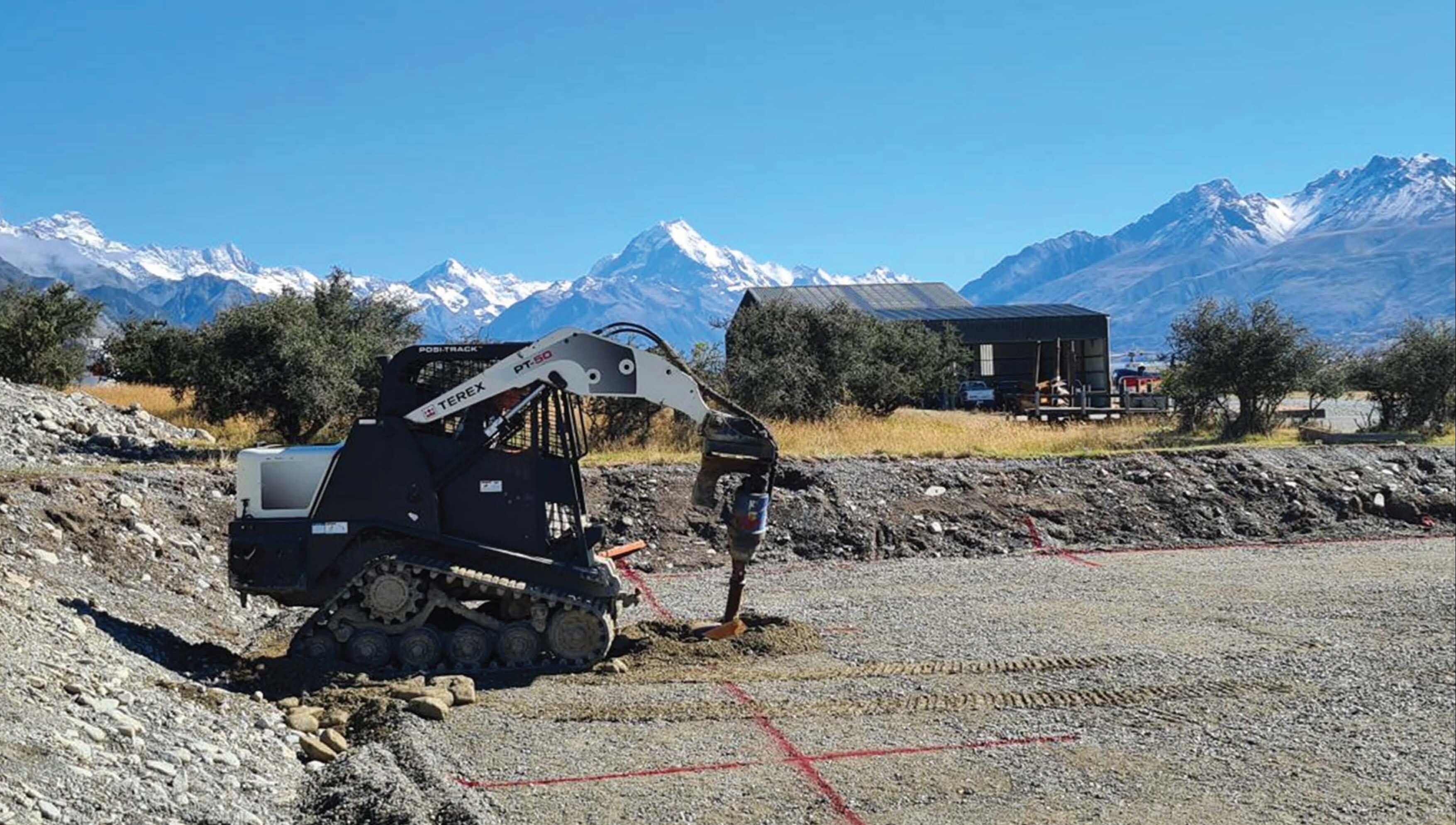 Drilling holes and site works for Alpine Shed build in Mackenzie country, New Zealand